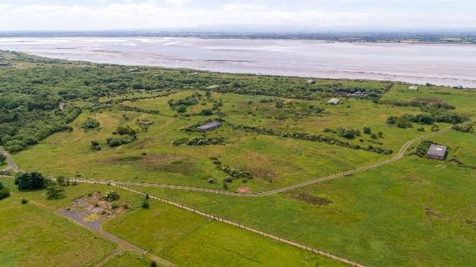 An aerial view of the Eastriggs site showing the location of the glycerine distillery and acids production areas looking south southeast on a sunny day.  