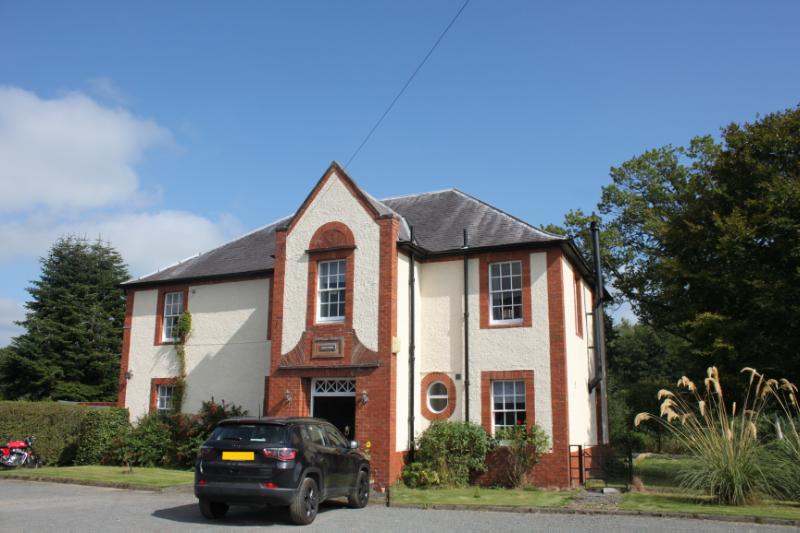 Killylung House (former Manager’s House), principal elevation, looking east, during daytime, on a sunny day with blue sky. 