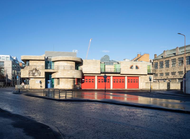 Tollcross Fire Station, main elevation, looking north, on a clear day with blue sky. 