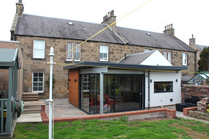 71 and 73 Bonnyrigg Road, rear elevation, looking northwest during daytime.