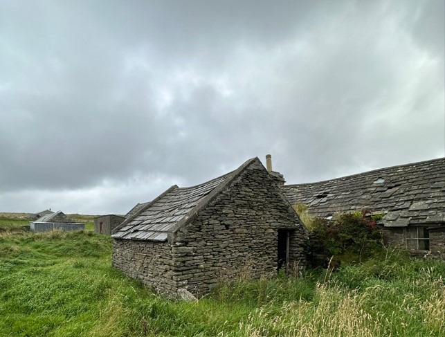 Outbuilding with flagstone slab roof covering adjoining rear of the Old Farmhouse.