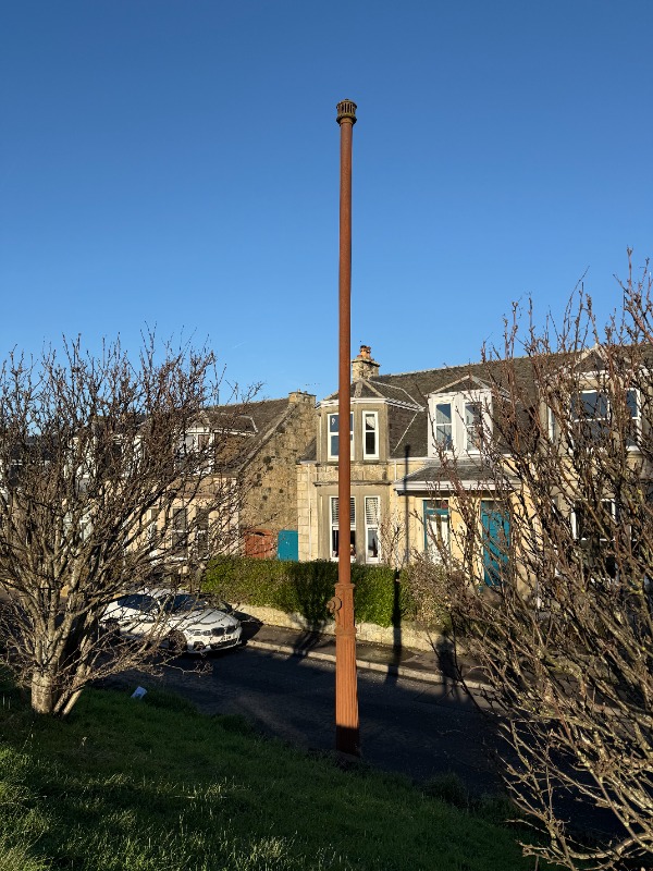 Ventilation Pipe Hill Place looking north during daytime, on clear day with blue sky. 